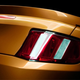 Illustration for article titled New 2010 Ford Mustang GT Teaser Photo Reveals A Duck-Tailed Rear End